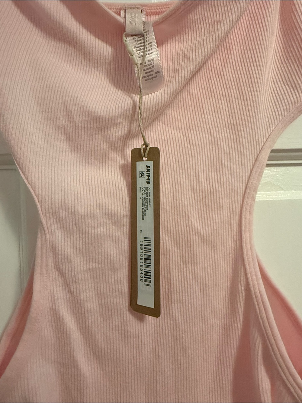 SKIMS Light Pink Ribbed Cut-Out Kids One-Piece Bodysuit - Picture 2 of 3